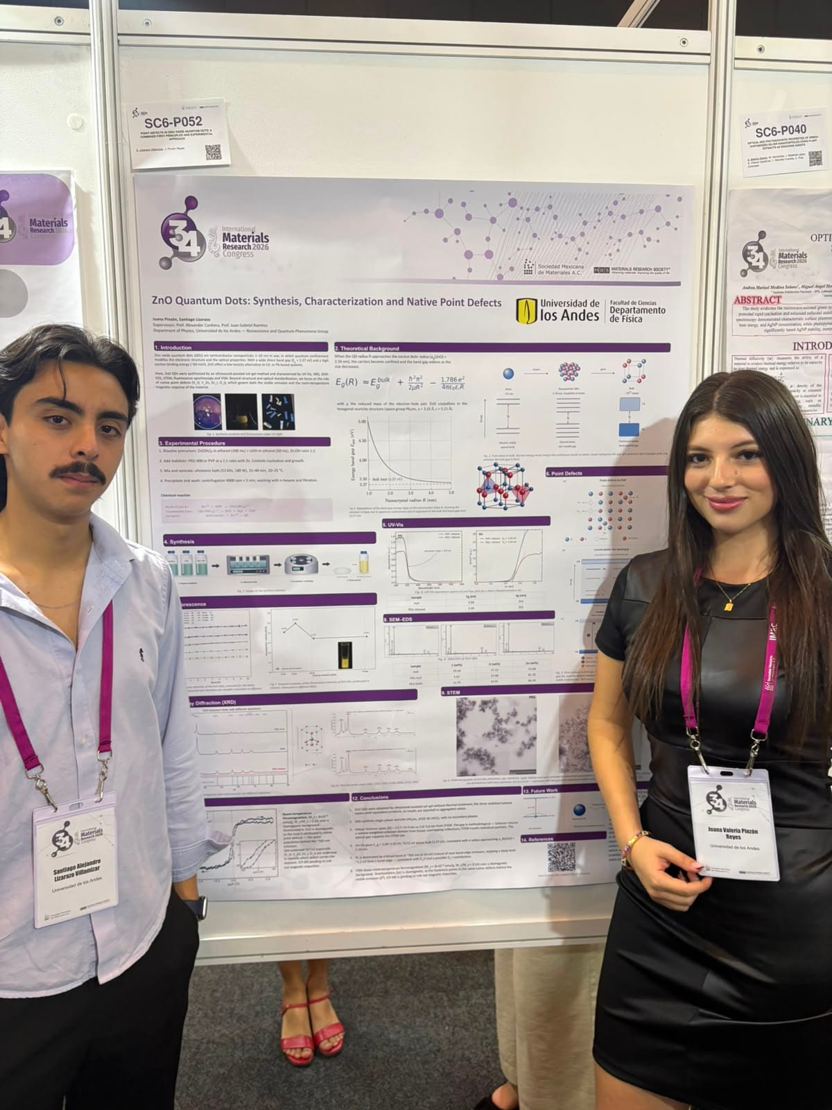 Santiago Alejandro Lizarazo Villamizar and Juana Valeria Pinzón Reyes beside their poster on ZnO quantum dots at IMRC 2026